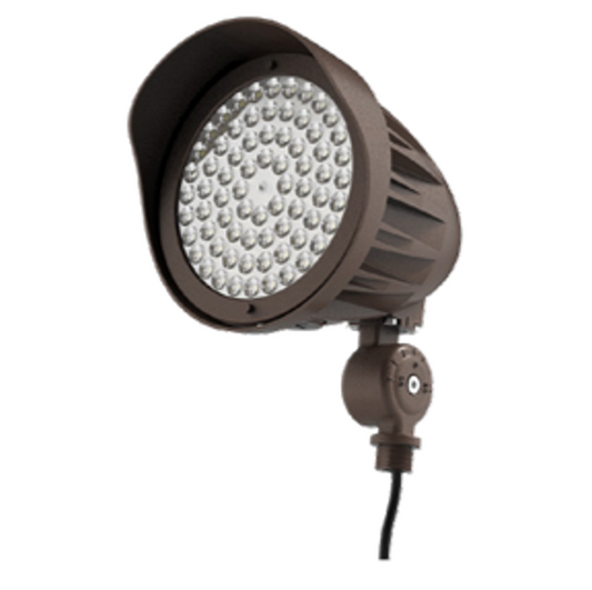 25W LED Bullet Floodlight. Power Select 25/20/15W. Color Select 30/40/50K. Built in photocell. 120-277V input. 4H x 4V optics lens with alternate 3H x 3V option. Knuckle mount included. Bronze housing.